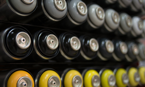 Spray paint cans.
